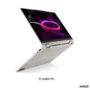 Lenovo Yoga 7 2-in-1 16, артикул 83TF003YRK: три четверти открыт, экран и клавиатура, наклейки AMD